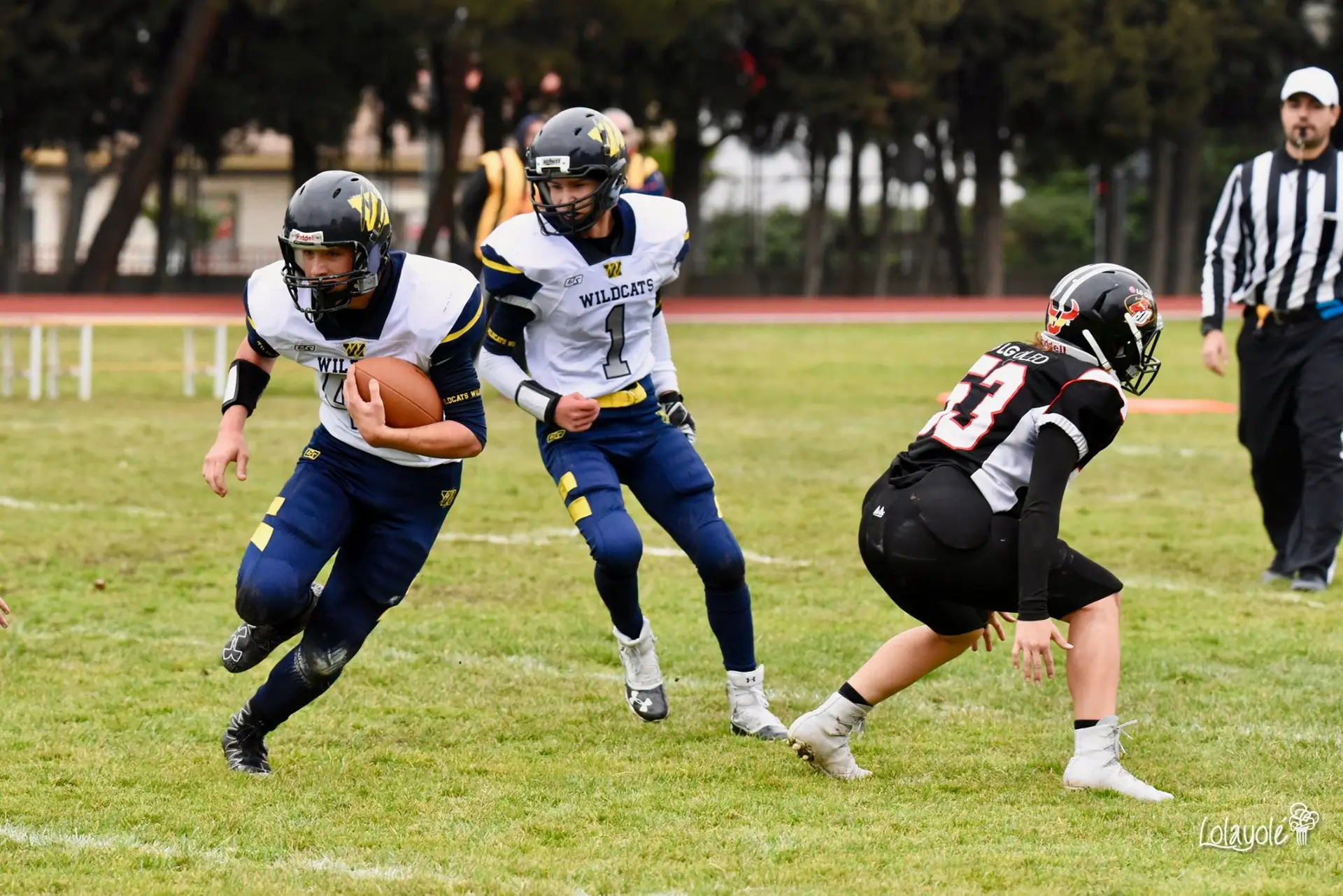 Partido de fútbol americano de la categoría cadete de los Wildcats